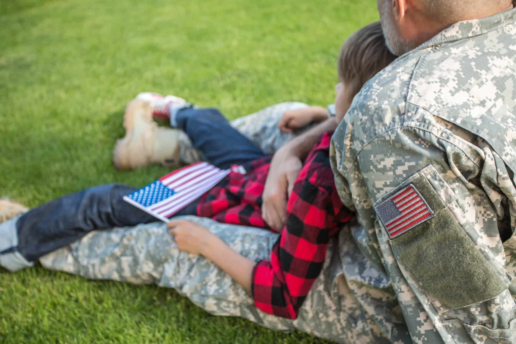 Veteran army with son on his lap - Sprint Funding