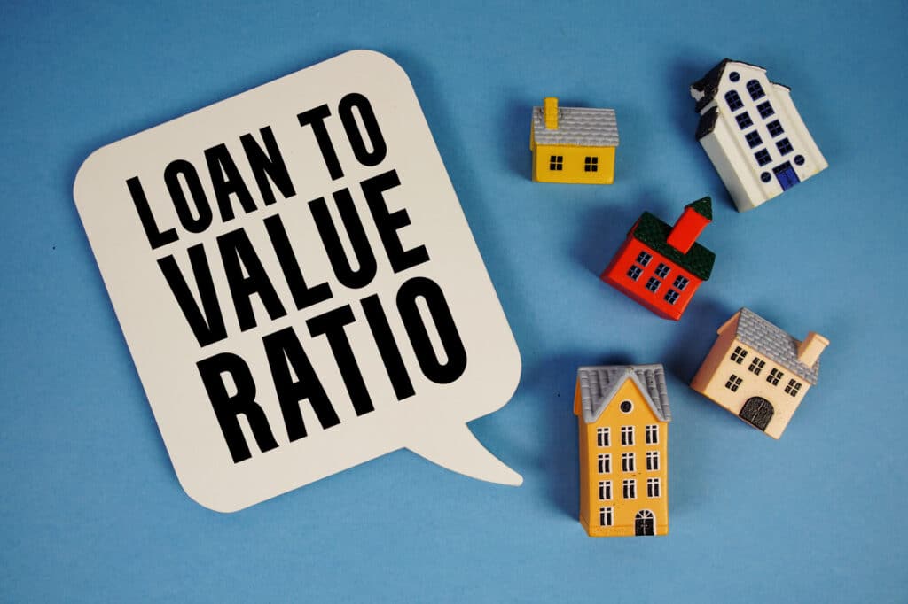 loan-to-value ratio text with miniature houses